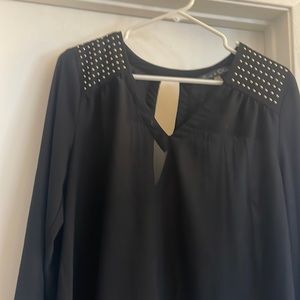 Black semi sheer blouse with gold studs and buttons on the sleeve